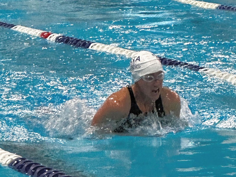 A Delta Retreads swimmer doing breaststroke